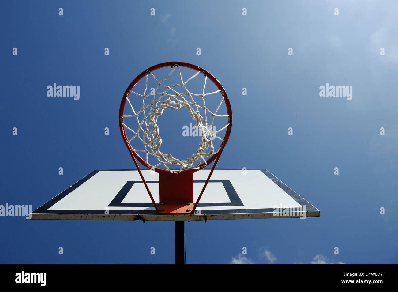 Basketball hoop and blue sunny sky Stock Photo Alamy