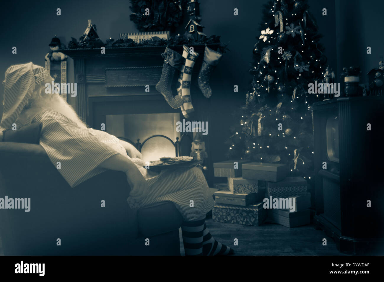 Santa resting after delivering toys on Christmas Eve Stock Photo Alamy