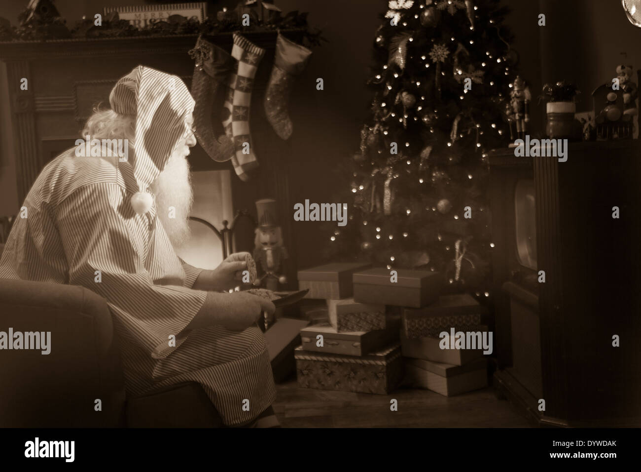 Santa resting after delivering toys on Christmas Eve Stock Photo - Alamy
