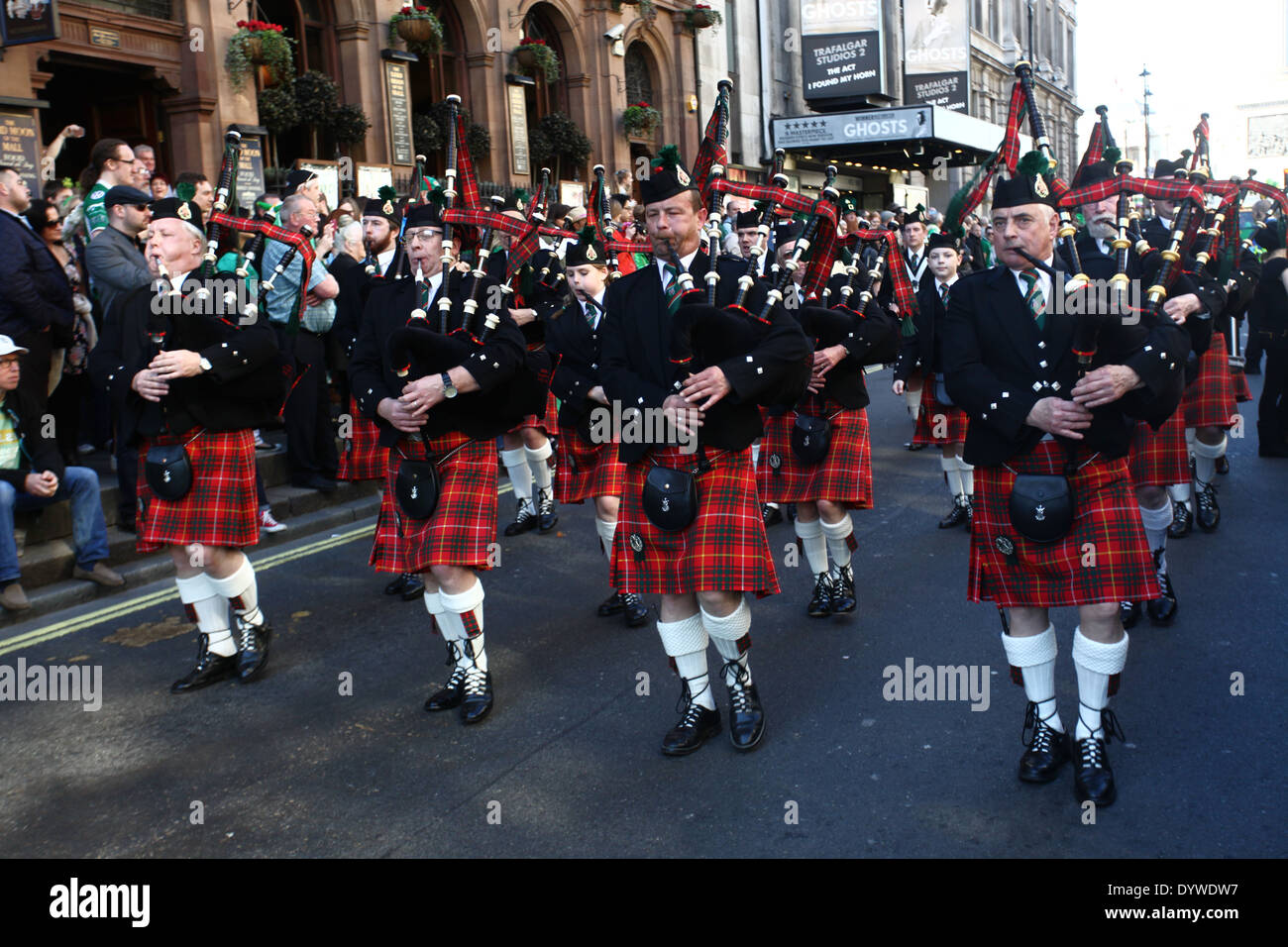 Scottish bagpipe band playing at St. Patrick Parade in London Stock