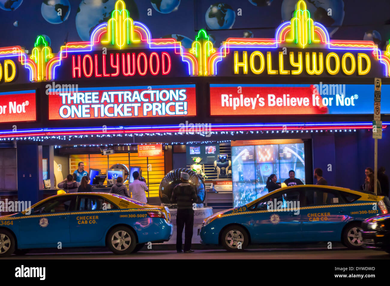 Los Angeles California,LA,Hollywood Boulevard,movie industry,Hollywood Walk of Fame,Ripley's Believe it or Not,museum,neon,sign,marquee,entrance,taxi, Stock Photo