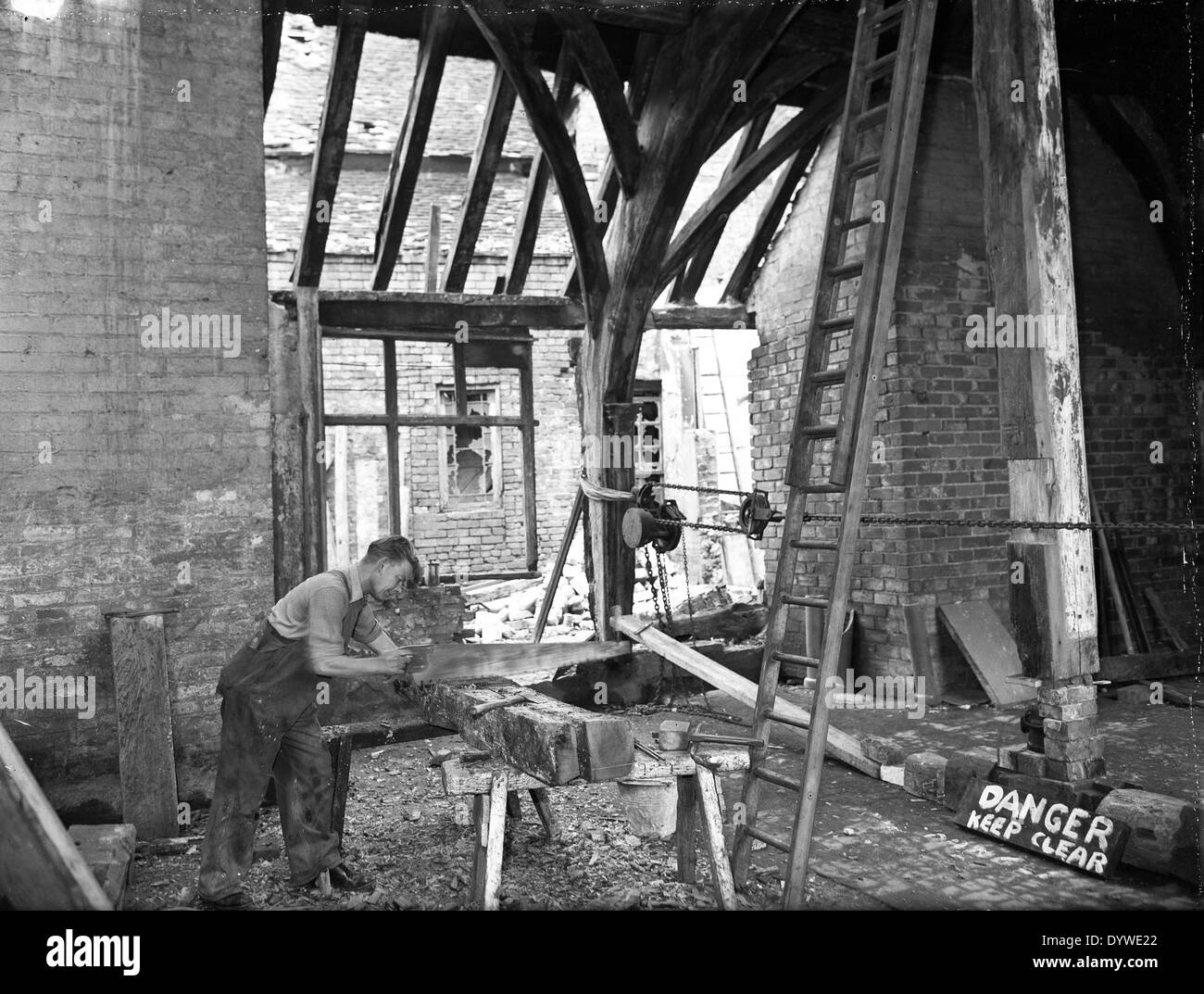 Craftsman restoring Old Hall Manor House at West Bromwich 1958 property restoration skilled worker 1950s Stock Photo