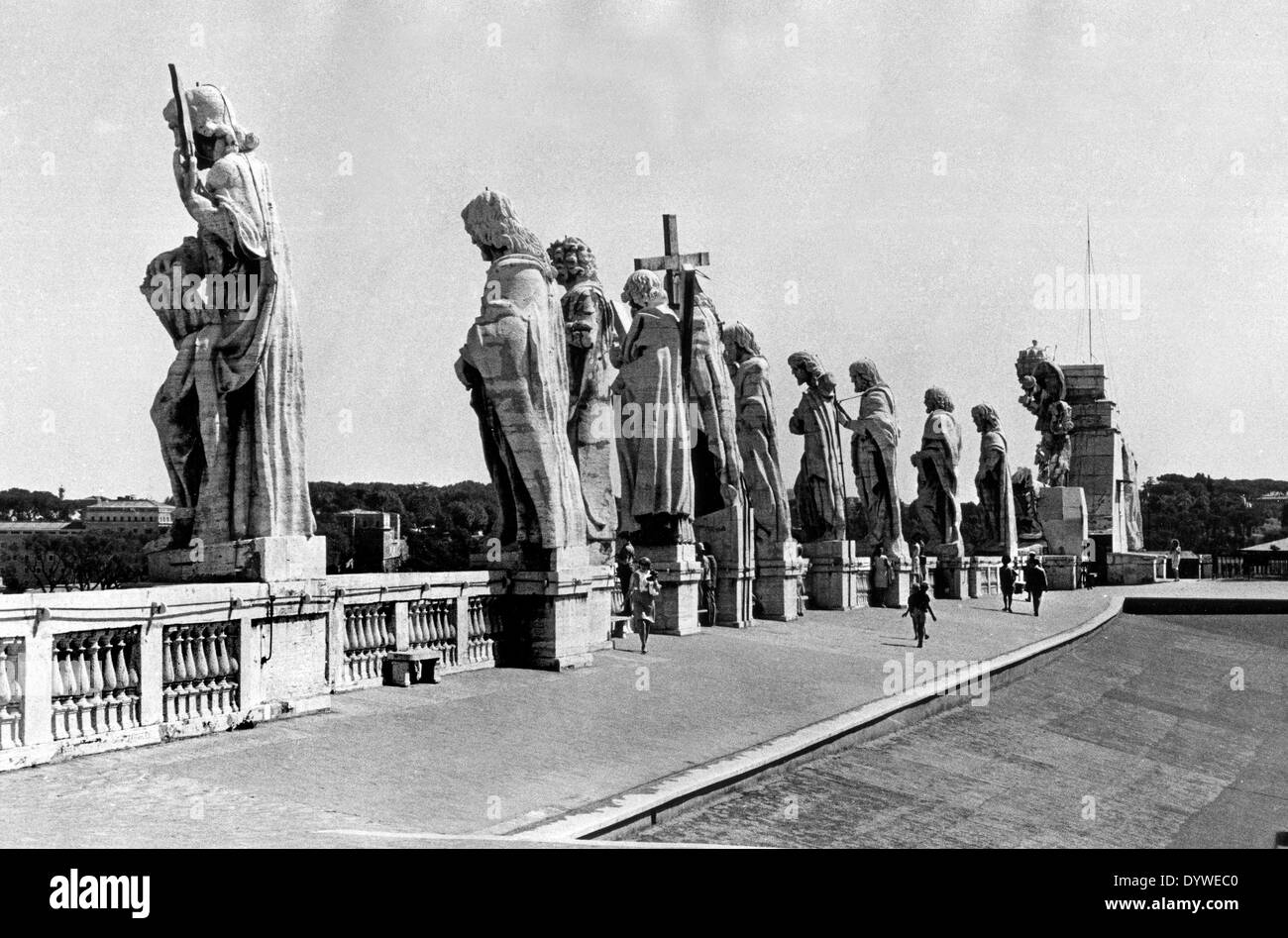 Statues of the apostles on the roof of the St Peter's Cathedral in Rome 1968. Rome city basilica 1960s historic Italy Italian Picture by David Bagnall Stock Photo