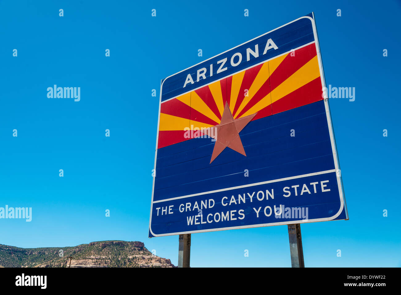 Arizona state border highway sign with a sky blue background Stock Photo
