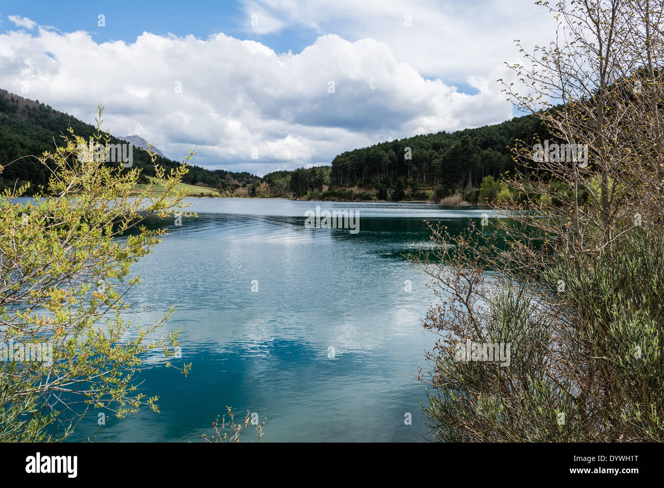 A blue lake under a cloudy sky - landscape Stock Photo - Alamy