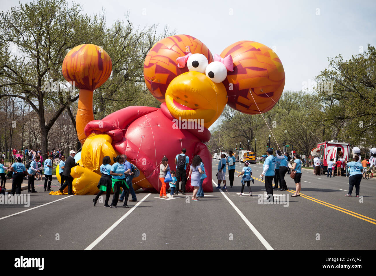 Inflating balloon float at parade Stock Photo