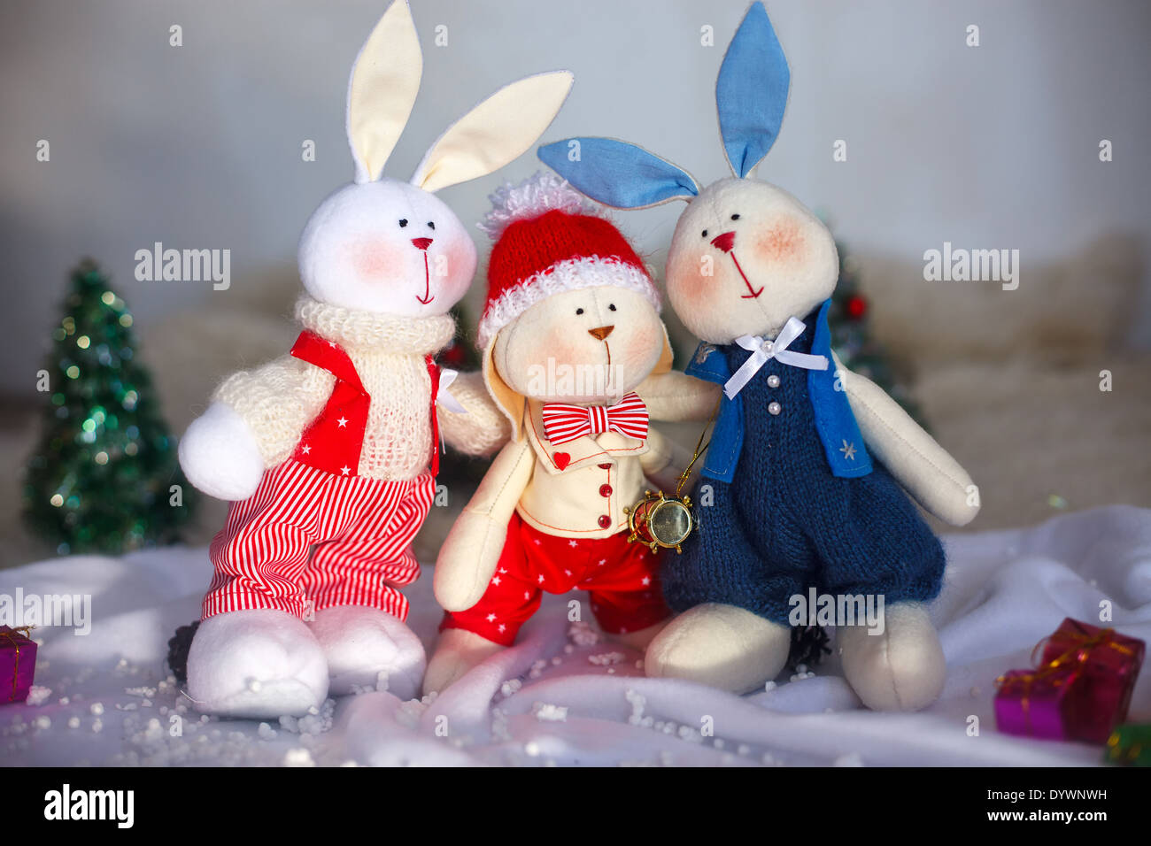 Christmas toy rabbits on the background trees Stock Photo Alamy