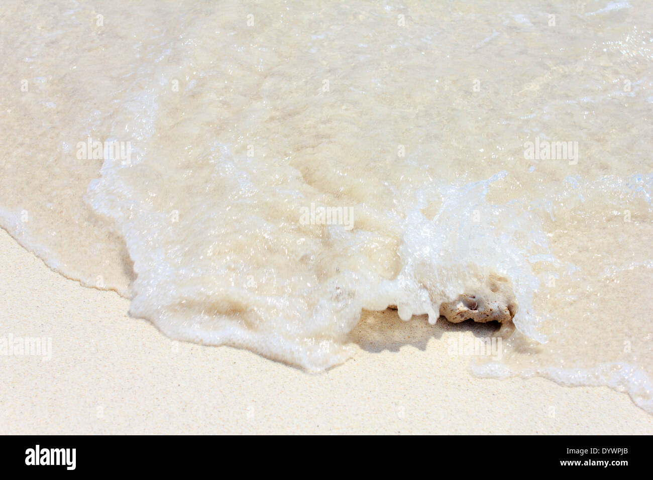 Blue water texture with small stones Stock Photo - Alamy
