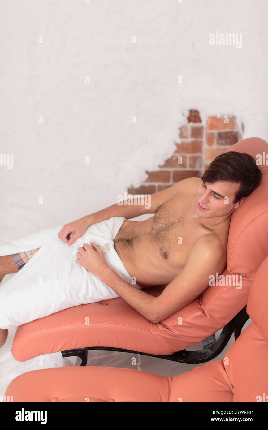 Young man relaxing in the salt room Stock Photo