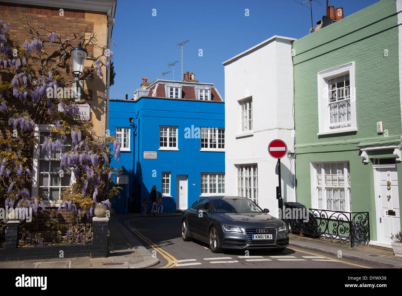 Brightly painted terraced houses in the exclusive area of Godfrey Street in Chelsea, West London