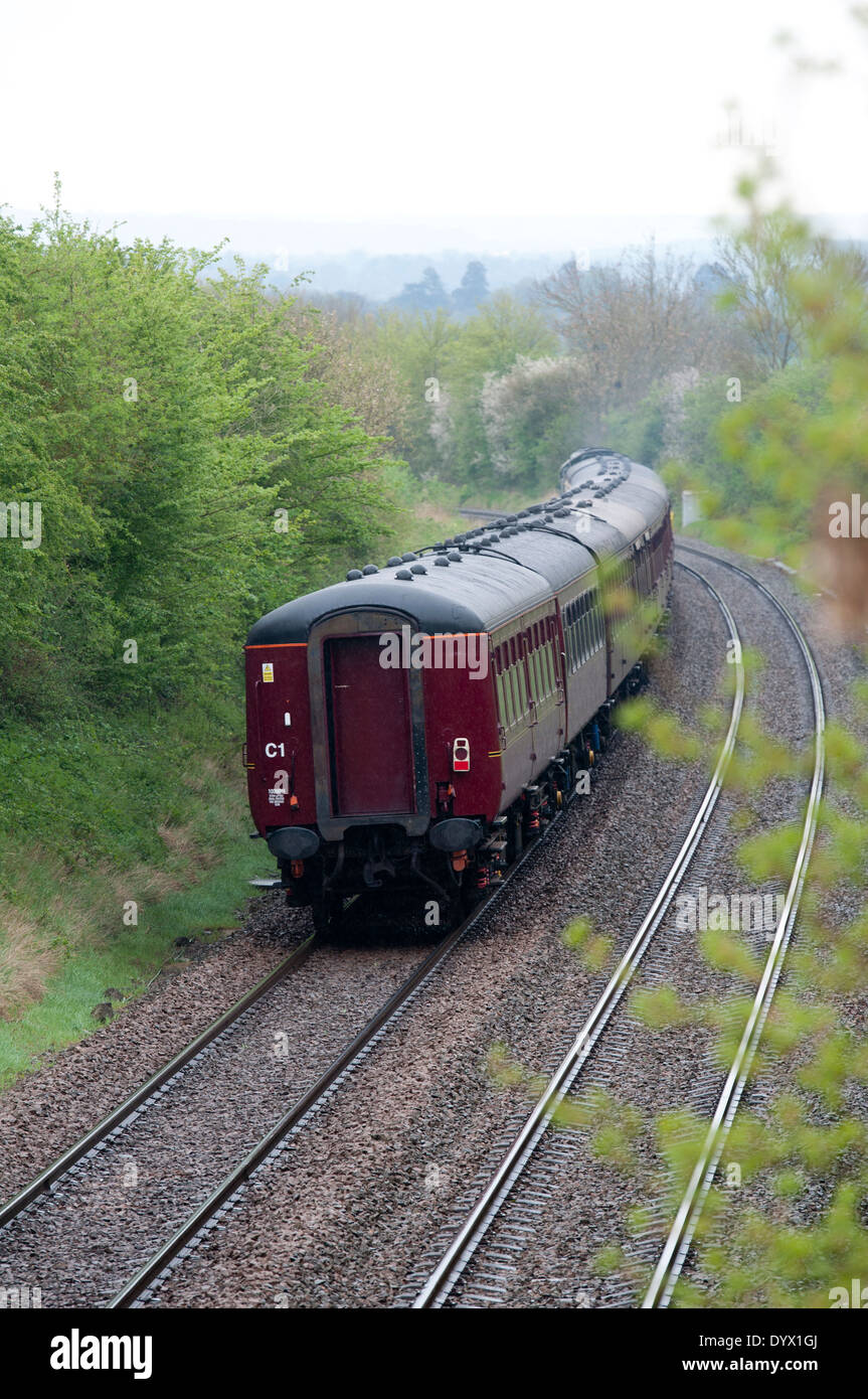 The Cathedrals Express steam-hauled train going away Stock Photo