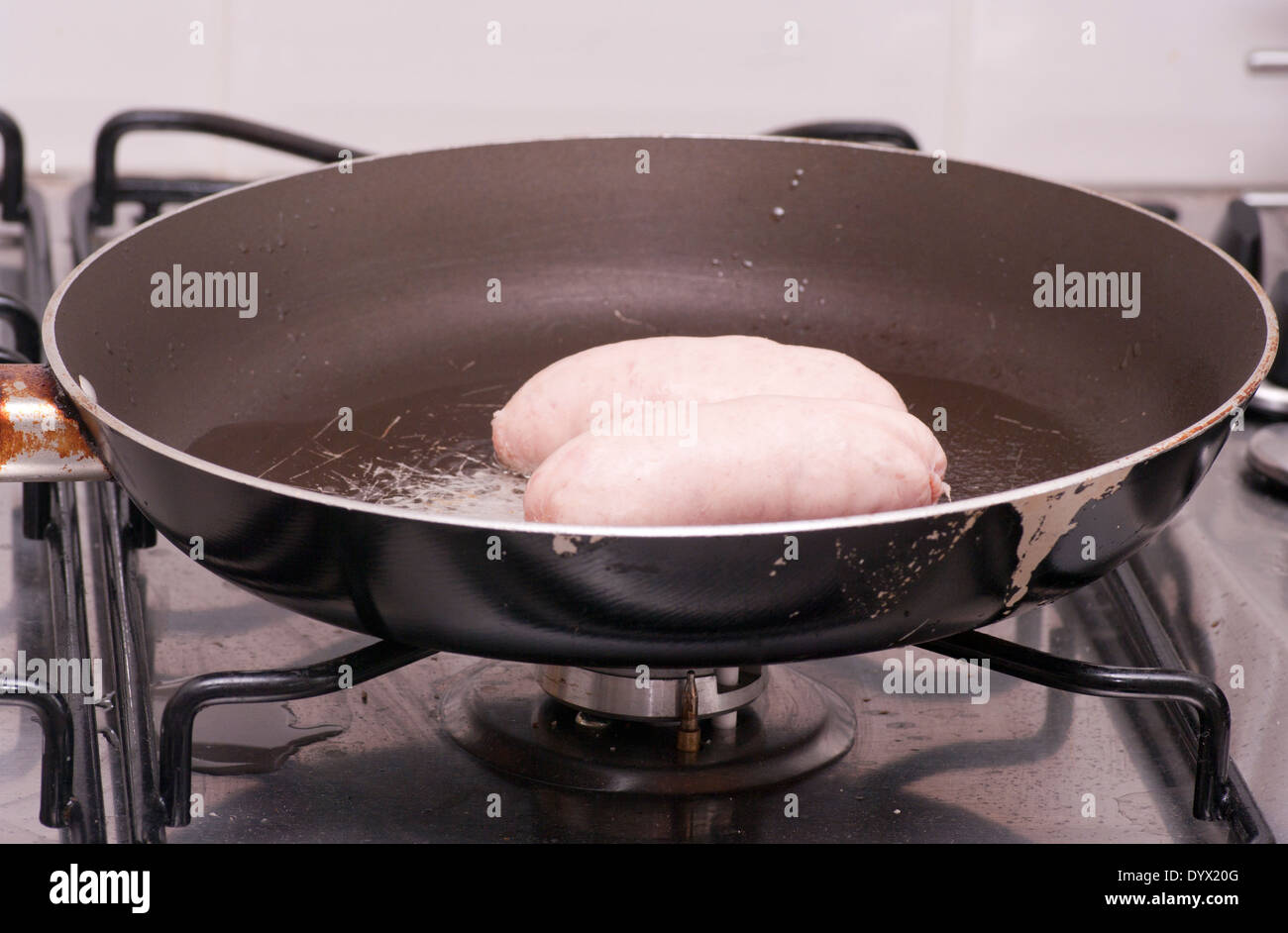 Sausages cooking in frying pan hires stock photography and images Alamy