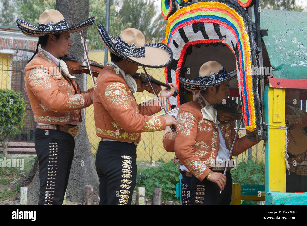 Three Mexican violinists in national costume Xochmilco Mexico City Mexico Stock Photo