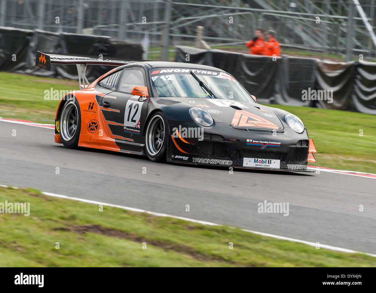 Porsche 997 GT3 R Sports Race Car in British GT Championship at Oulton Park Motor Racing Circuit Cheshire England UK Stock Photo