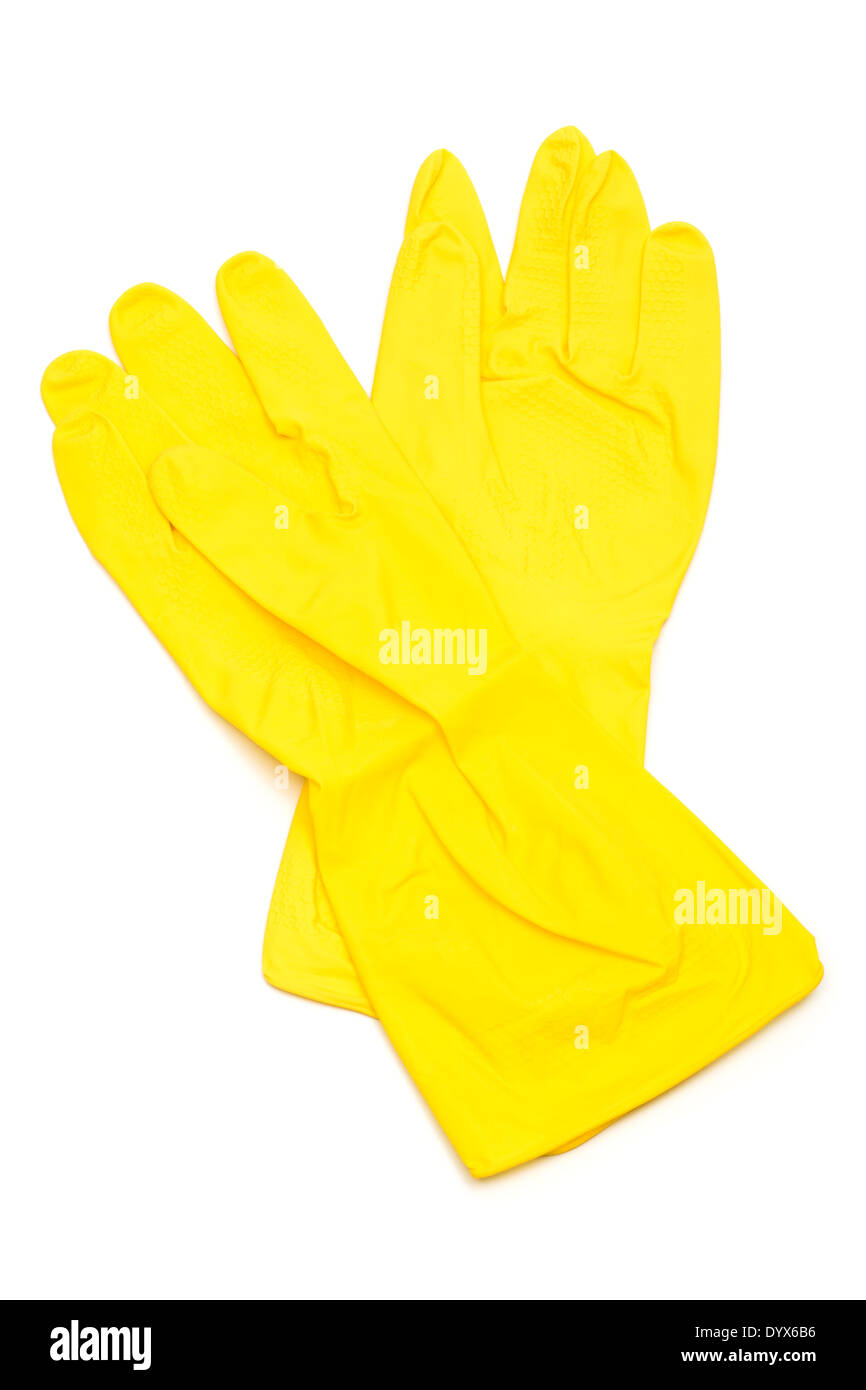 Yellow rubber gloves on a white background Stock Photo - Alamy