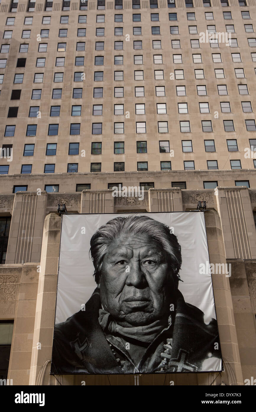 Portraits from the art exhibition called Butterflies & Buffalo hang outside at Two North Riverside Plaza in Chicago, IL. Stock Photo