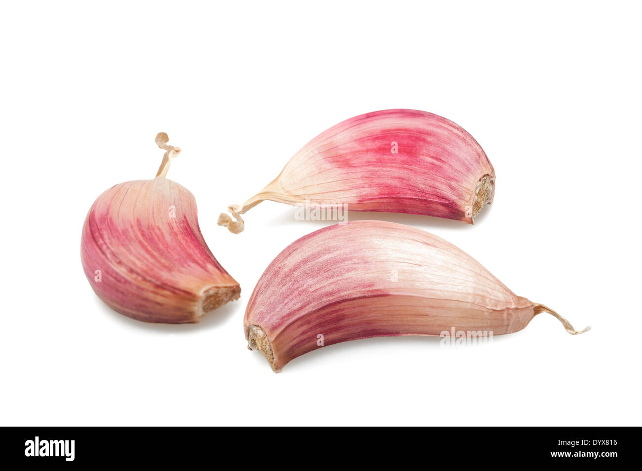 Red garlic cloves isolated on white Stock Photo Alamy
