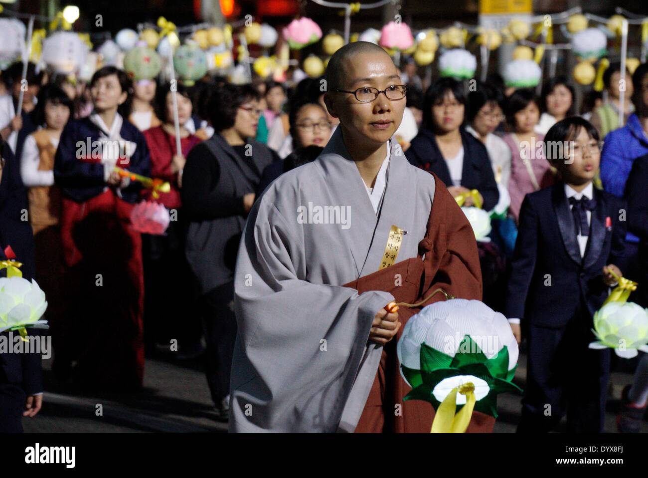 Seoul, South Korea. 26th Apr, 2014. South Korean Buddhists parade during the Buddha Era 2558 Lotus Lantern Festival to celebrate Buddha's birthday on May 6th. Credit:  Jun-Sang Lee/ZUMA Wire/ZUMAPRESS.com/Alamy Live News Stock Photo