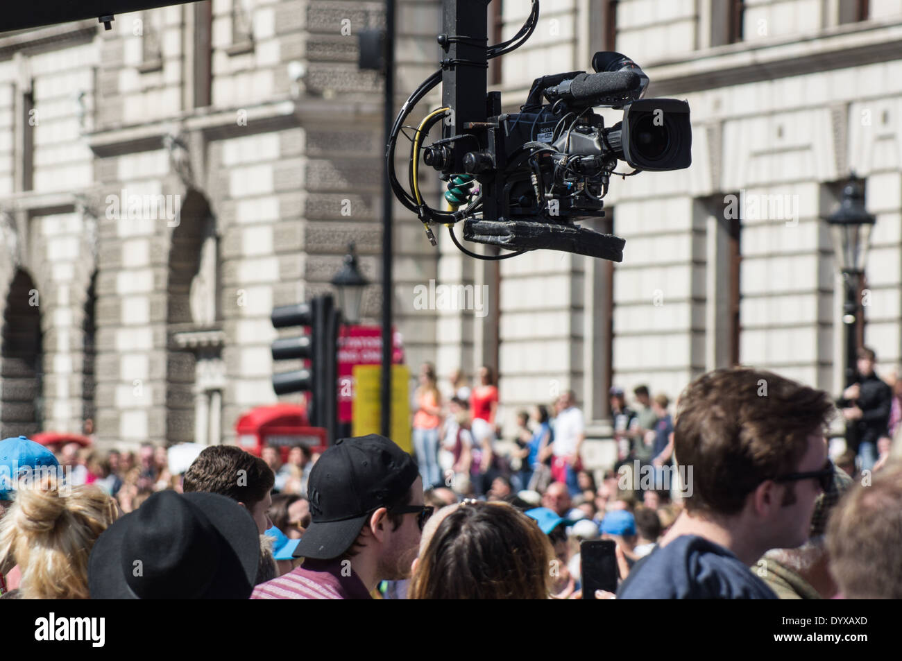 Television camera above the crowd in London, England United Kingdom UK Stock Photo