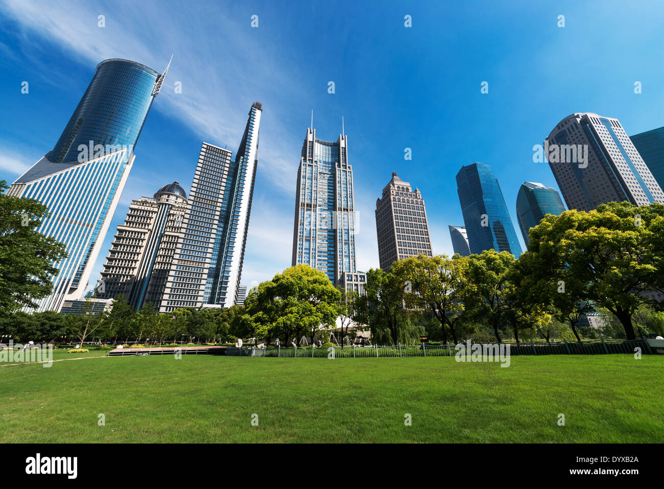 park and skyscrapers under the blue sky in shanghai Stock Photo
