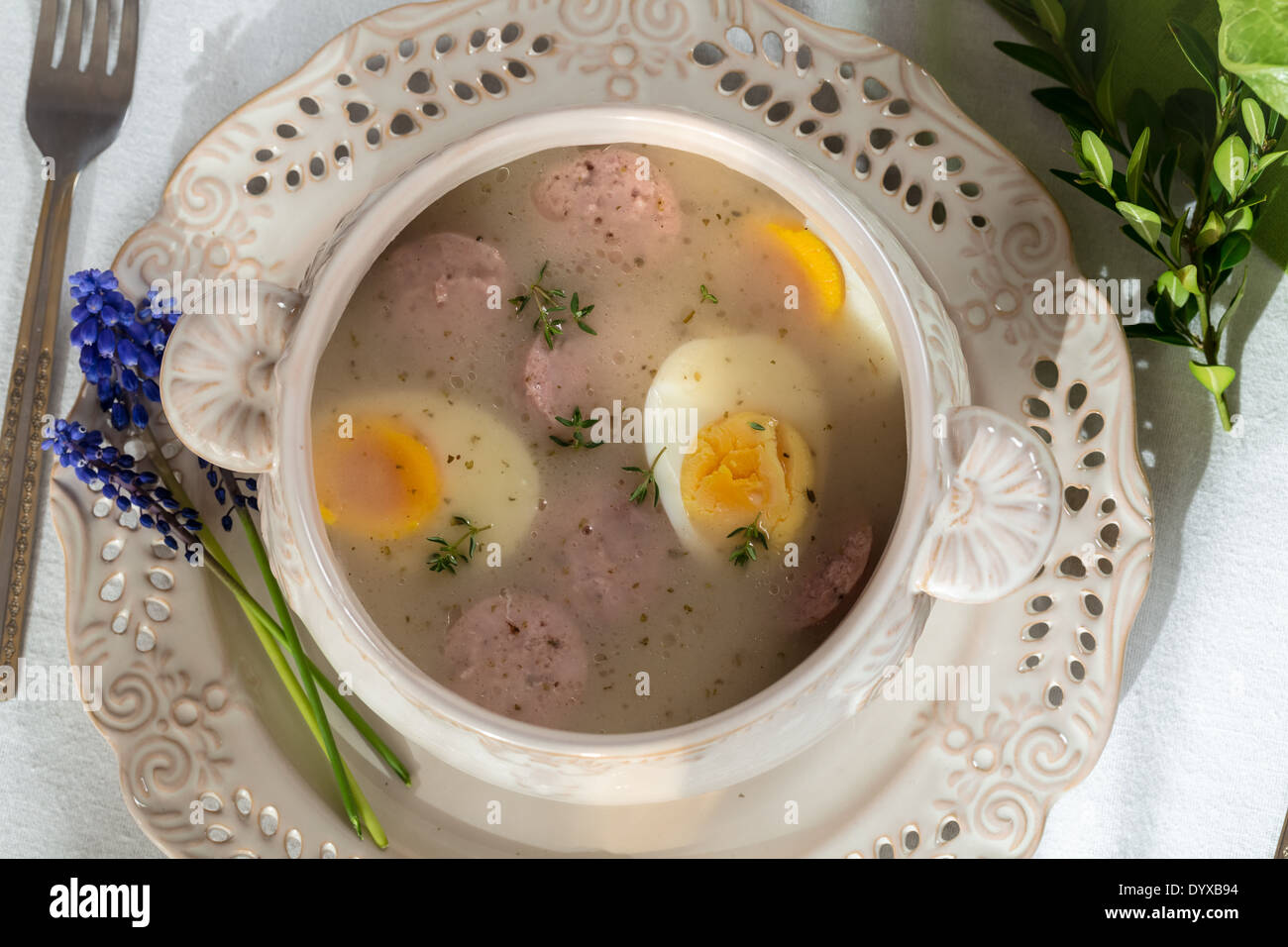 Sour soup spiced with marjoram Stock Photo Alamy