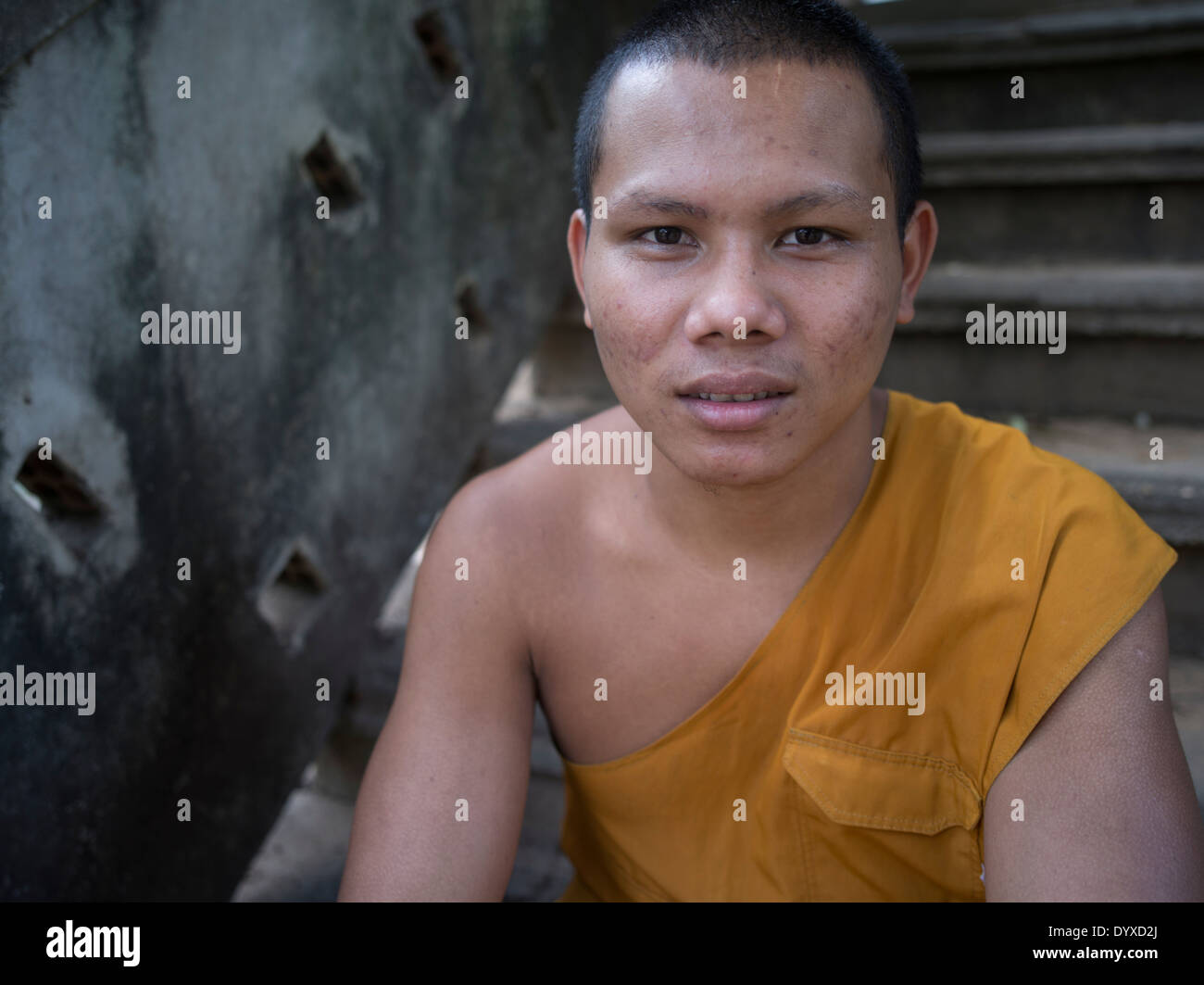 Young Buddhist monk at Lolei Temple ( Roluos Group ) , Siem Reap, Cambodia Stock Photo