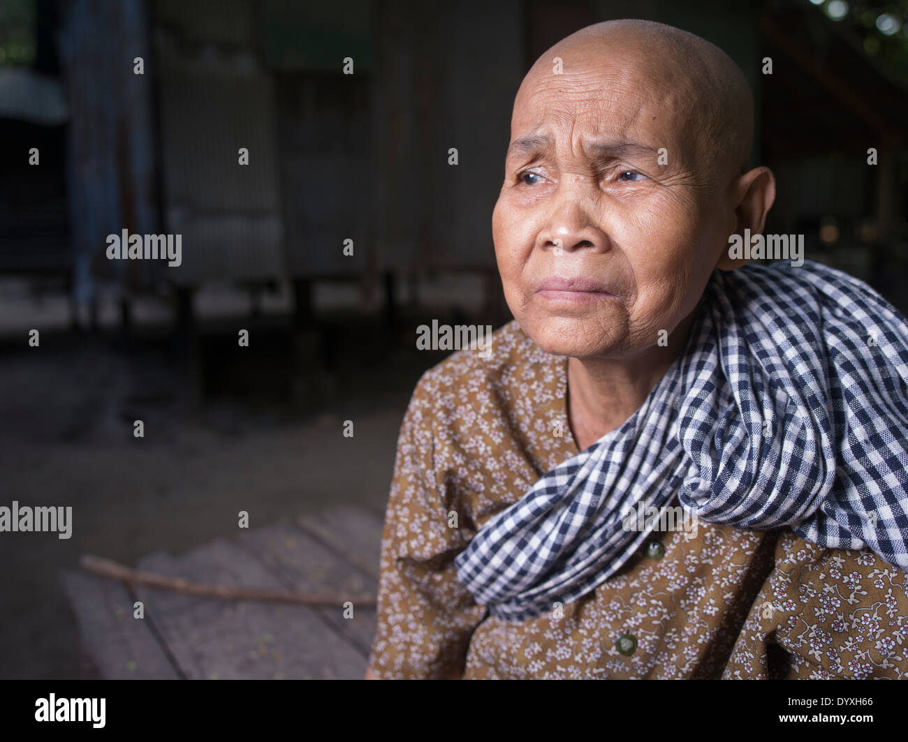 Cambodian Buddhist nun beside Bayon Temple, Angkor Thom, Siem Reap, Cambodia Stock Photo