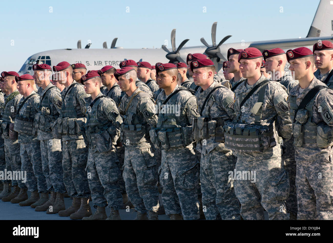 US Army paratroopers with the 173rd Airborne Brigade Combat Team stand in formation after arriving April 26, 2014 in Siauliai, Lithuania. The soldiers were deployed to Lithuania, Poland, Latvia and Estonia as tensions with Russia rise over Ukraine. Stock Photo