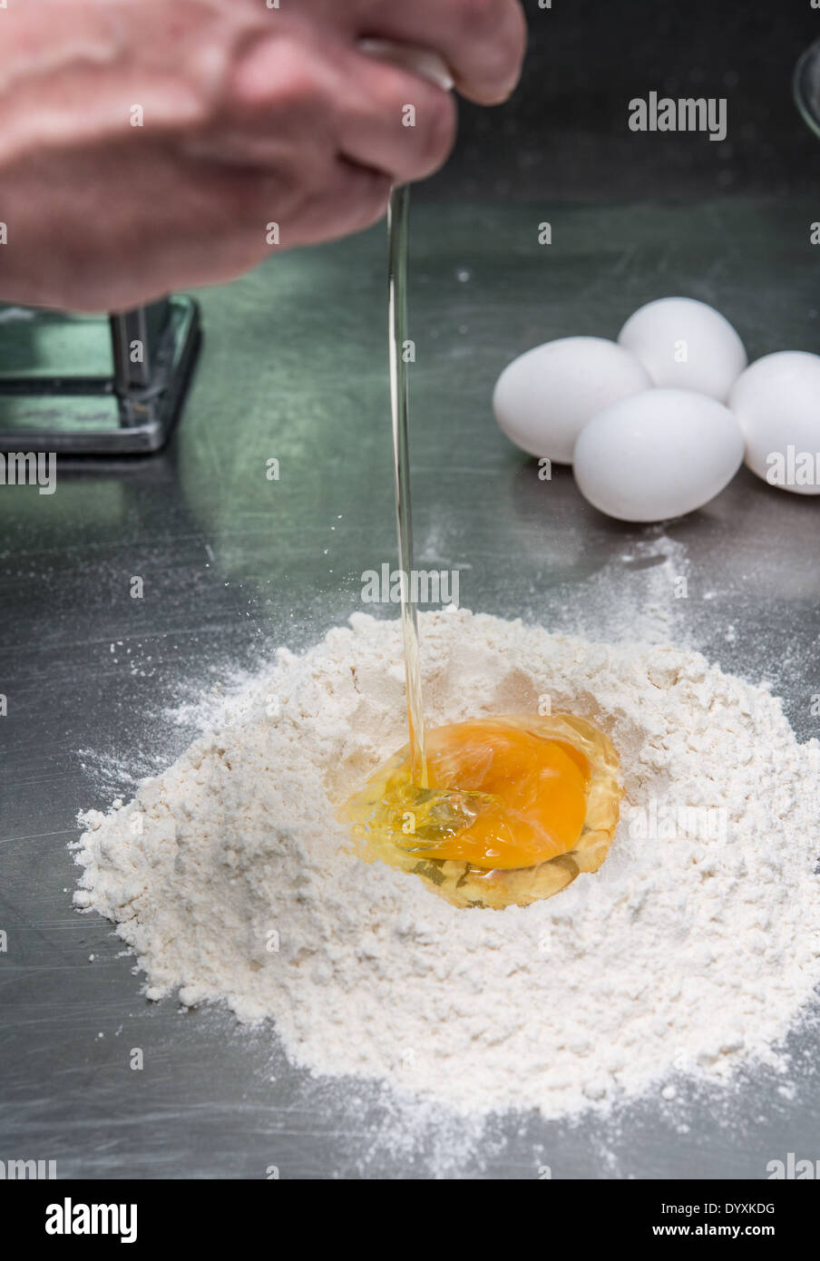 Making Tortellini pasta mixing flour and egg Stock Photo Alamy
