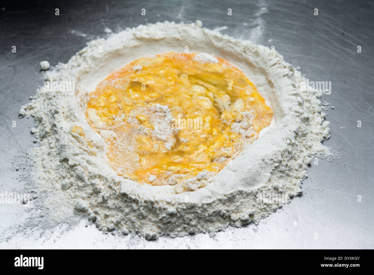 Making Tortellini pasta mixing flour and egg Stock Photo Alamy