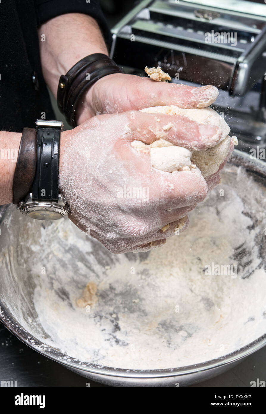 Making Tortellini pasta kneading the dough Stock Photo Alamy