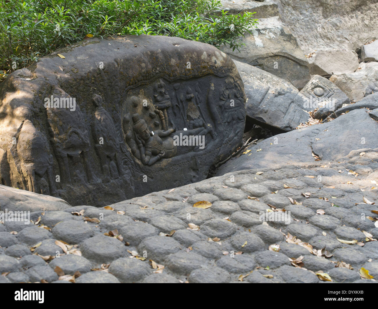 Vishnu reclines for entertainment of the world. Kbal Spean carvings in the riverbed northeast of Angkor. Siem Reap, Cambodia Stock Photo