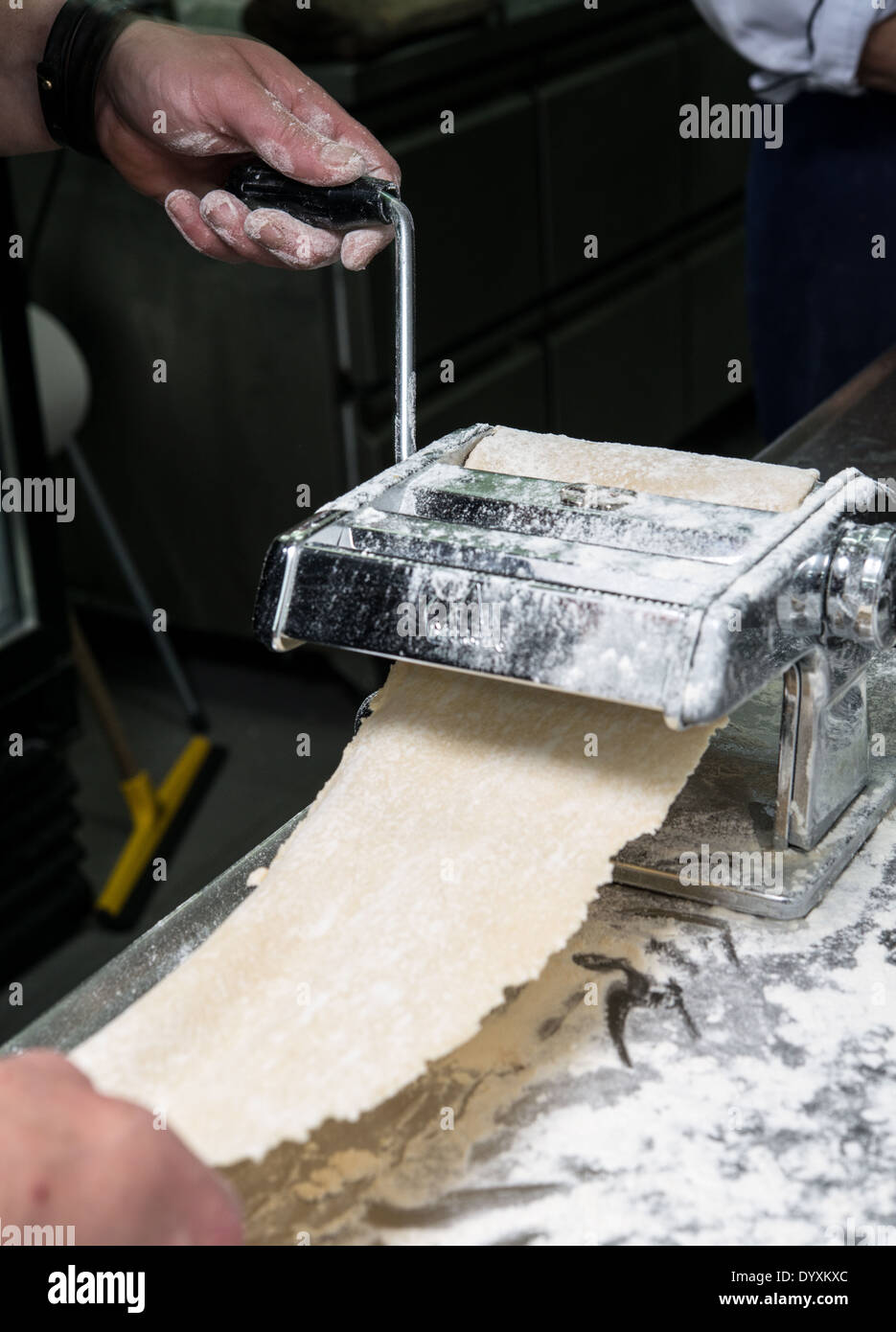 Making Tortellini pasta flattening the dough Stock Photo Alamy
