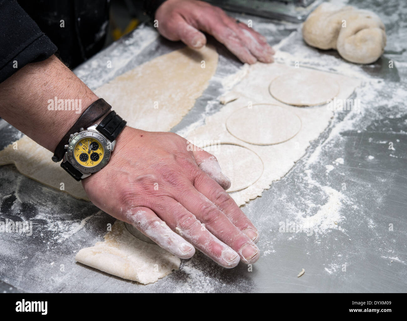 Making Tortellini pasta cutting to size Stock Photo Alamy