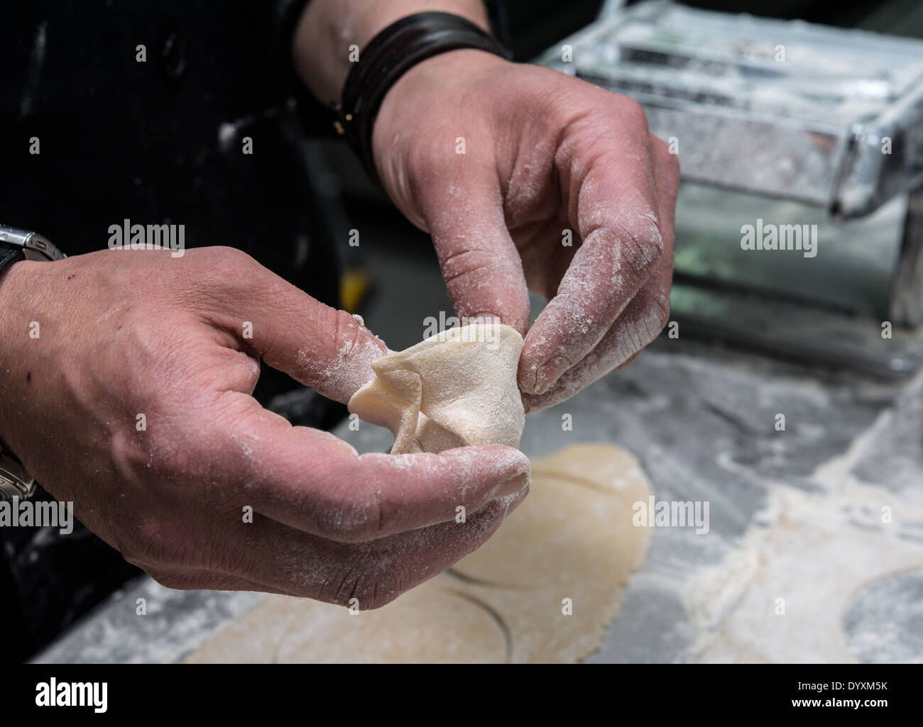 Making Tortellini pasta Stuffing the dough Stock Photo Alamy