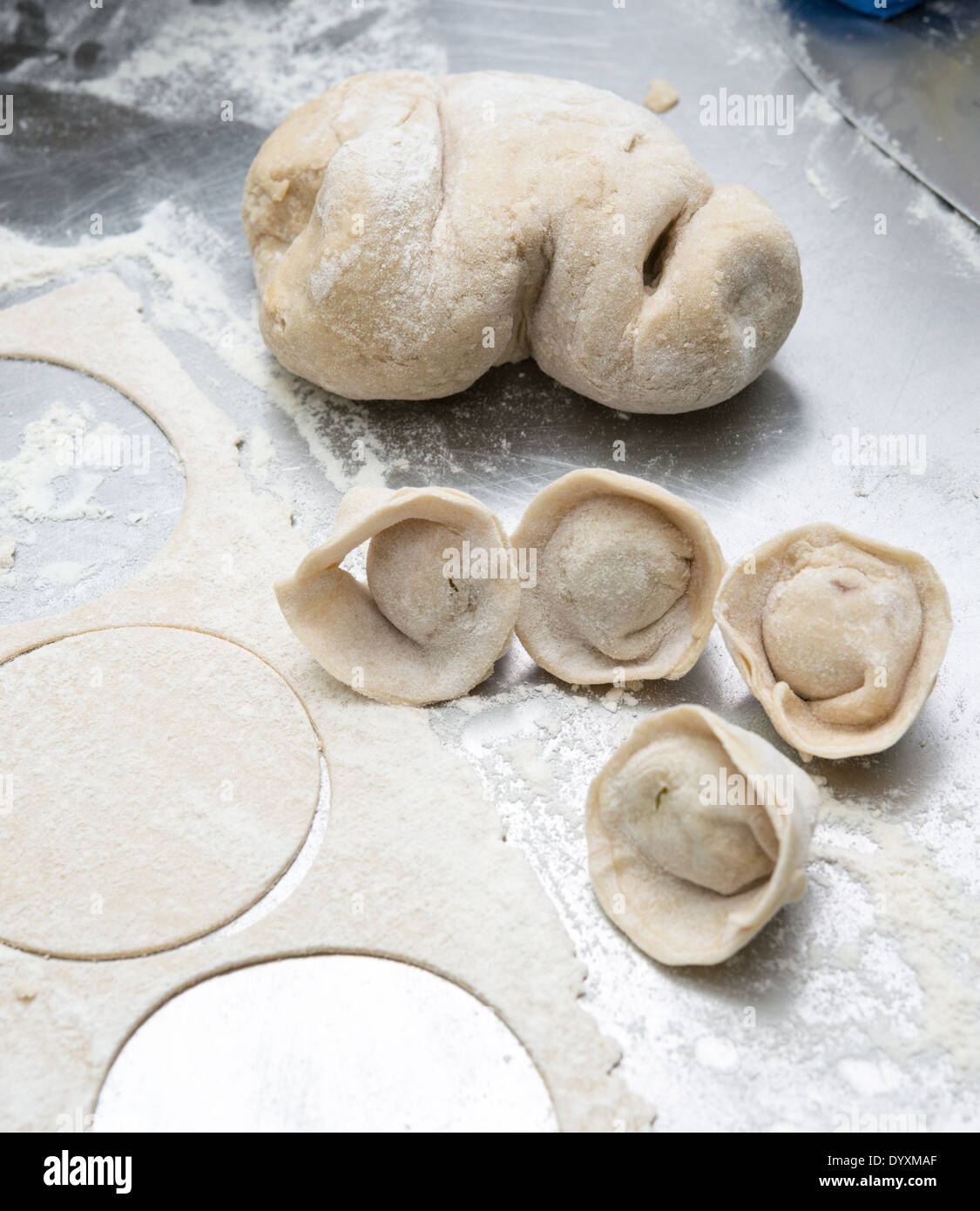 Making Tortellini pasta Stuffing the dough Stock Photo Alamy