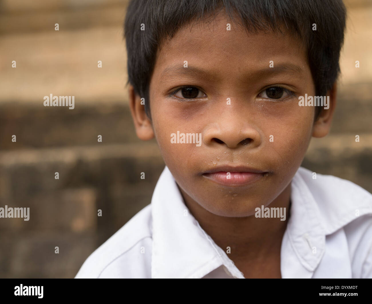 Young Cambodian boy hanging out at Prasat Kravan a Hindu temple constructed of brick. Siem Reap, Cambodia Stock Photo