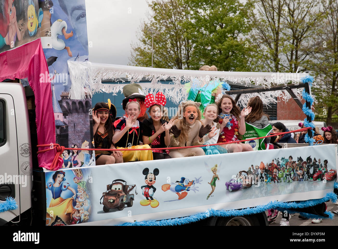 Biggin Hill,UK,27th April 2014,Positive Path walkers on a float dressed as Disney characters who are raising money for the the Chartwell Cancer Trus Credit: Keith Larby/Alamy Live News Stock Photo
