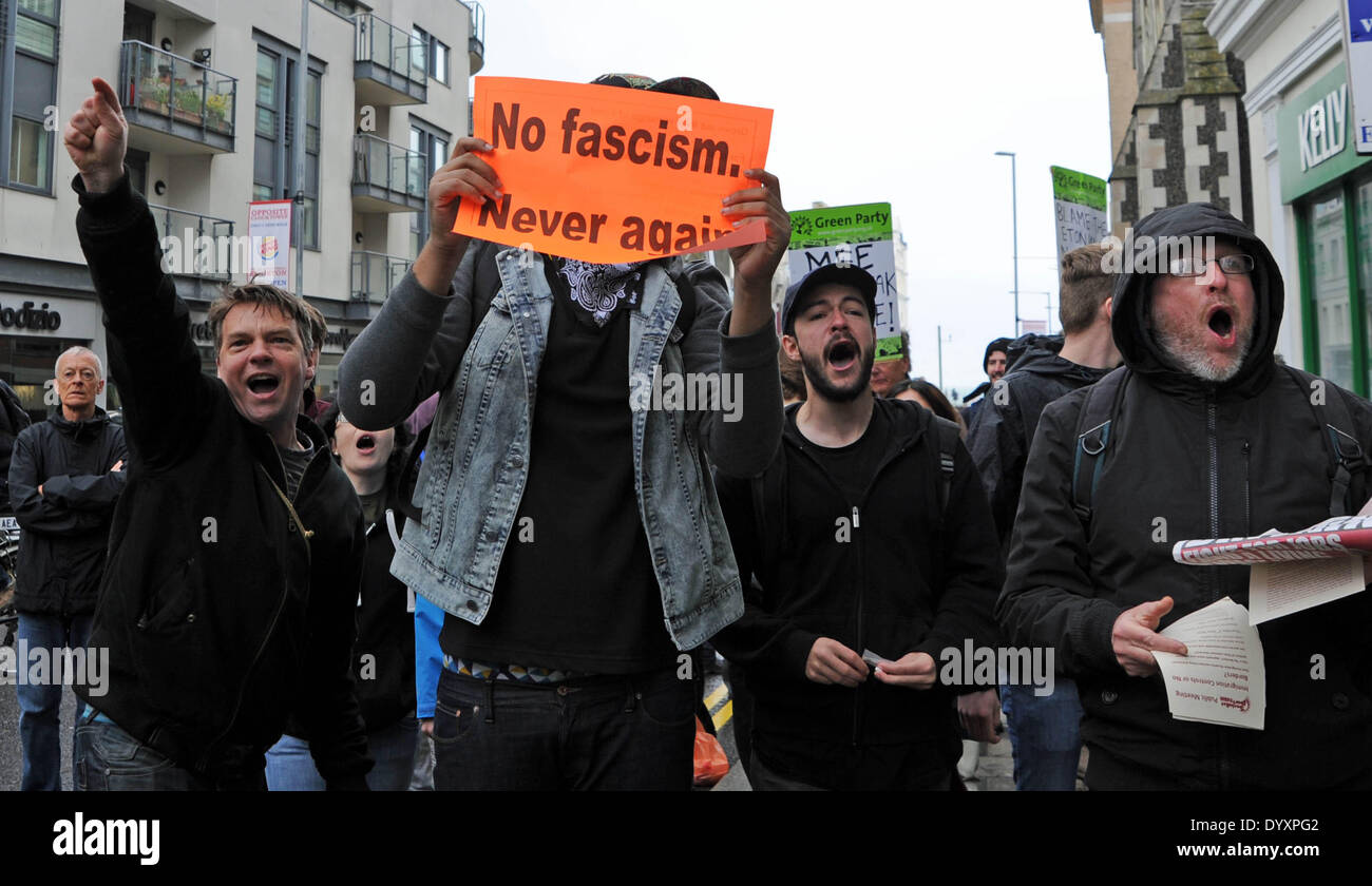 Anti fascism protesters try to disrupt the March for England Rally in Brighton today.About 100 people took part in the rally which caused major disruption in the city with a massive police presence trying to keep anti fascist protesters away from the marchers Stock Photo