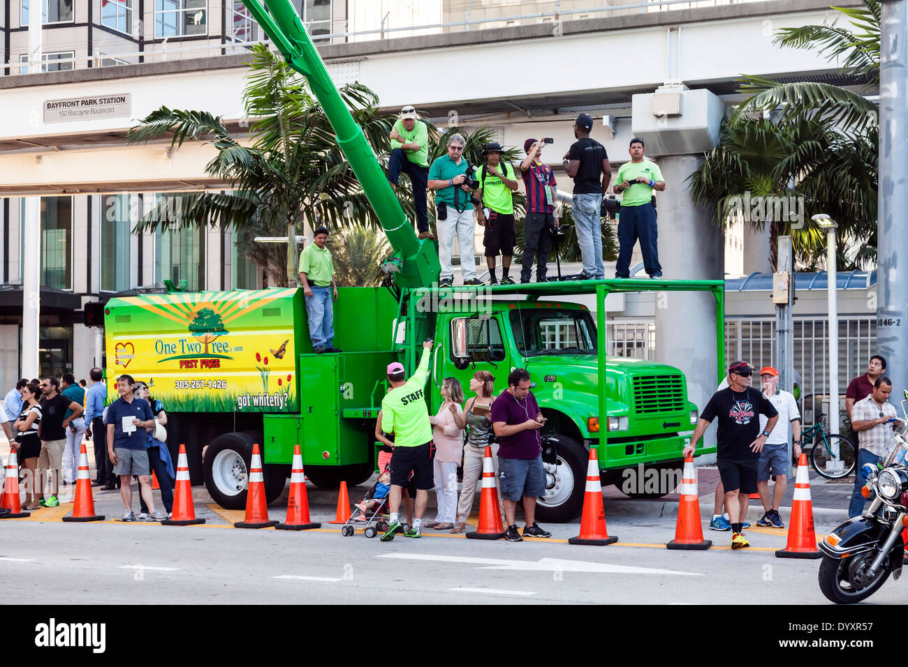 Photographers and cameramen photographing start of 2014 Mercedes-Benz Corporate Run from bucket truck in Miami, Florida, USA. Stock Photo