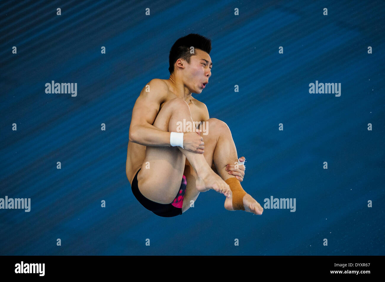London, UK. 27th Apr, 2014. Chen Aisen of China (CHN) dives in the Mens 10m Platform Semifinals during day three of the FINA/NVC Diving World Series 2014 at the London Aquatics Centre. Credit:  Action Plus Sports/Alamy Live News Stock Photo