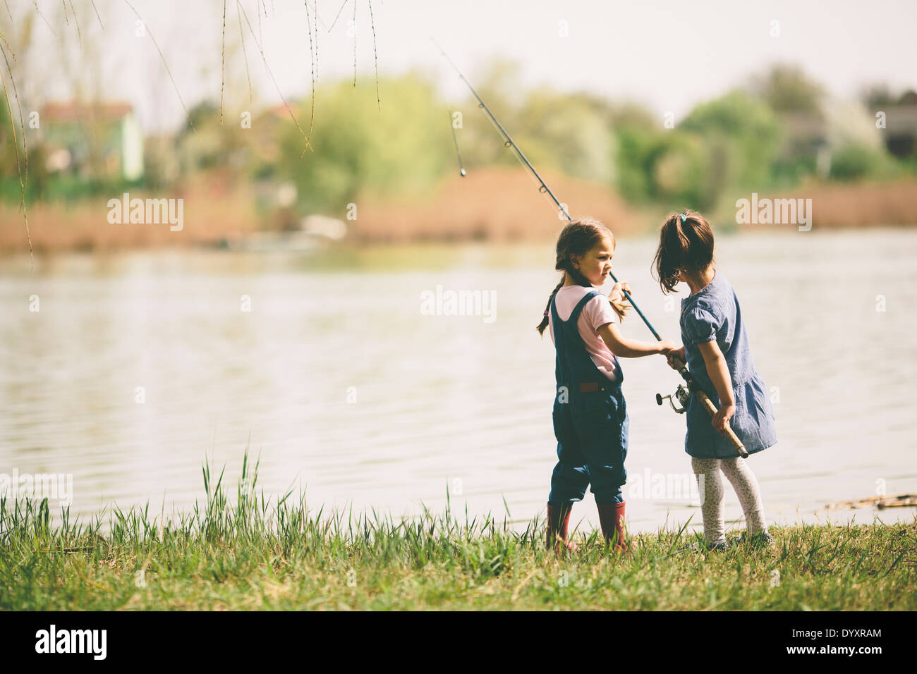 Child fishing hi-res stock photography and images - Page 7 - Alamy
