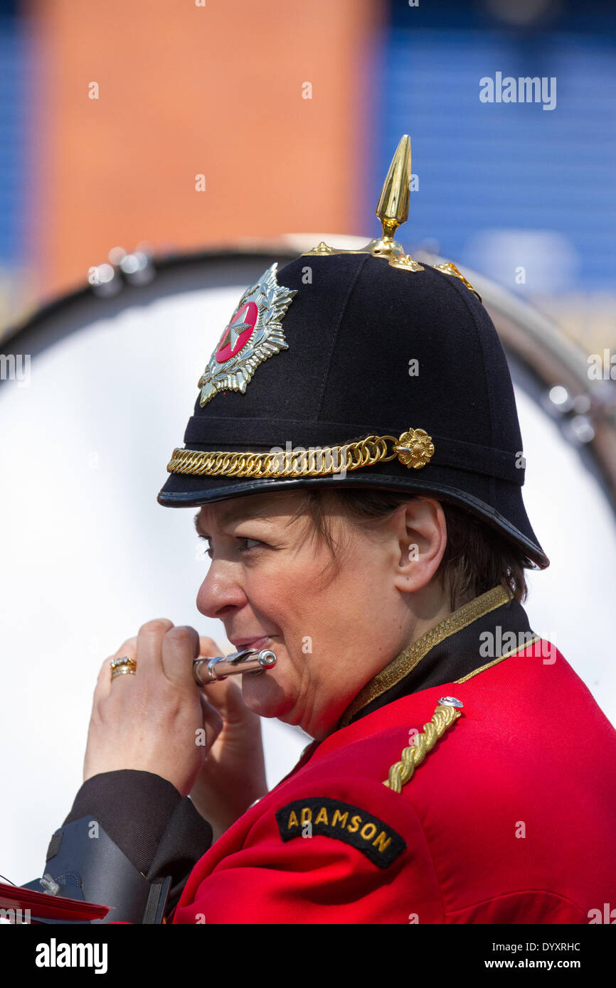 Manchester, UK 27th April, 2014. Flute player (The Adamson Band) at the  St George's weekend celebrations, a family event held in Albert Square and Piccadilly, an extension of the annual St George Parade and a venture to help celebrate England's Patron Saint, with many activities & performers.  Manchester embraces the days when both national festivals and parades aim to bring the city together and provide Mancunians with an event where different national identities are celebrated.  Credit:  Mar Photographics/Alamy Live News Stock Photo