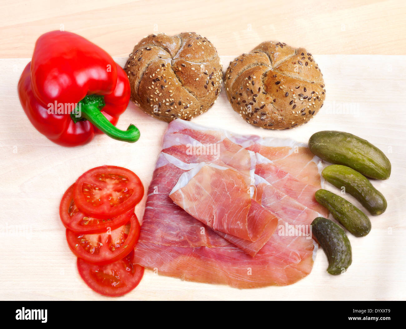 Vegetables with ham and wholewheat buns Stock Photo
