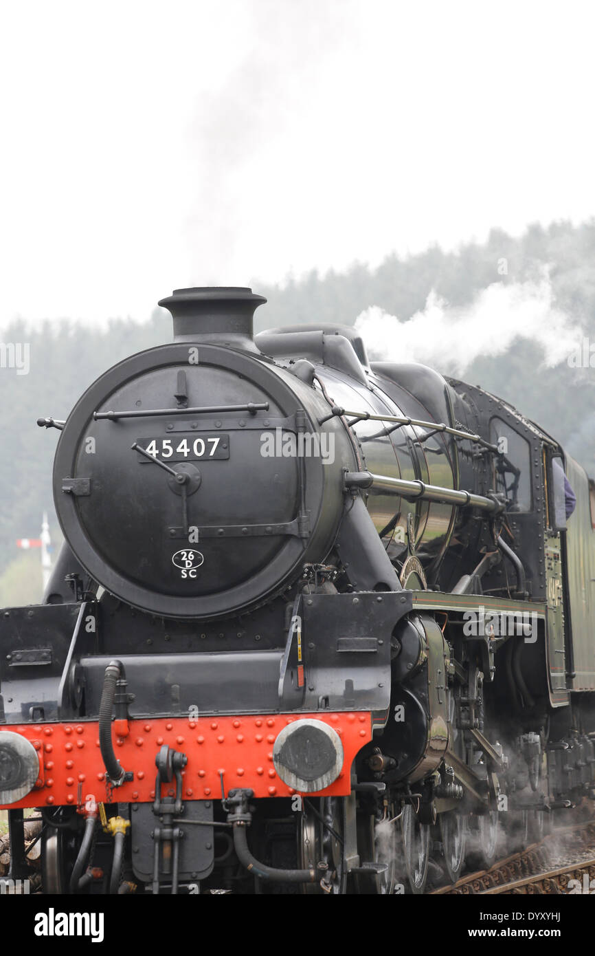 North Yorkshire Moors Railway; Levisham, North Yorkshire. 27th Apr, 2014.  LMS Stanier Class 5 4-6-0 Black 5 No. 45407 ‘Lancashire Fusilier’ shunting freight at Levisham Station during the Spring Steam Gala for the benefit of spectators. Credit:  Alan Walmsley/Alamy Live News Stock Photo
