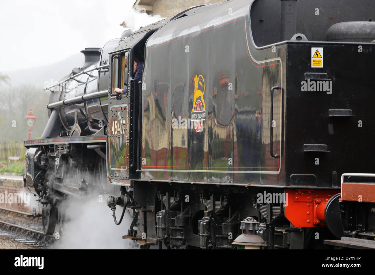 North Yorkshire Moors Railway; Levisham, North Yorkshire. 27th Apr, 2014.  LMS Stanier Class 5 4-6-0 Black 5 No. 45407 ‘Lancashire Fusilier’ shunting freight at Levisham Station during the Spring Steam Gala for the benefit of spectators. Credit:  Alan Walmsley/Alamy Live News Stock Photo