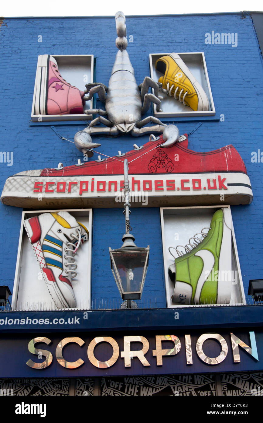 Scorpion Shoes shop on Camden High Street with shoe and scorpion sculptures brands branding London England UK Stock Photo