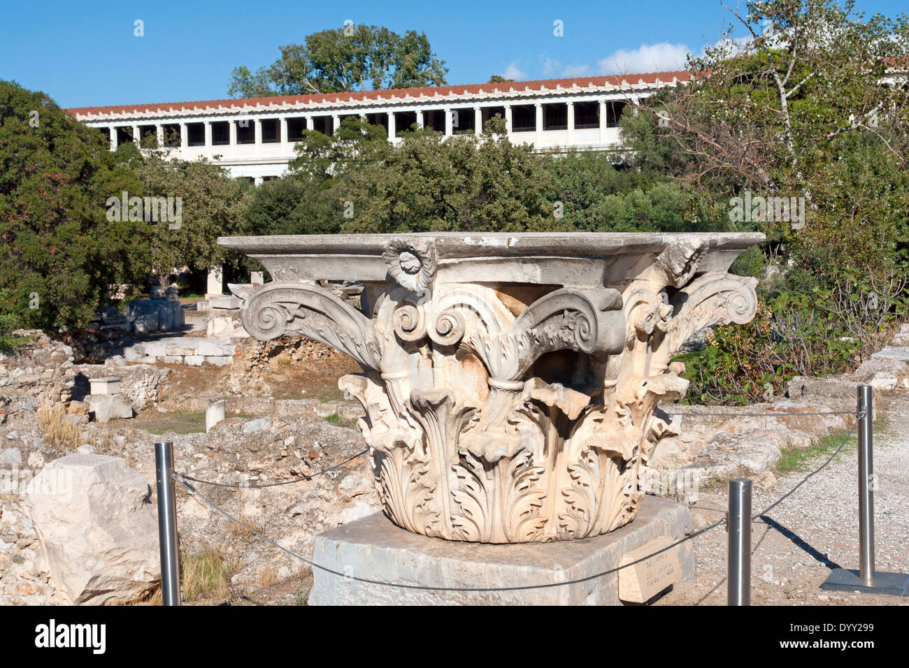 Capital of a Corinthian column in the Agora, Athens,Greece, with the American Schookl of Classical Studies in the background. Stock Photo