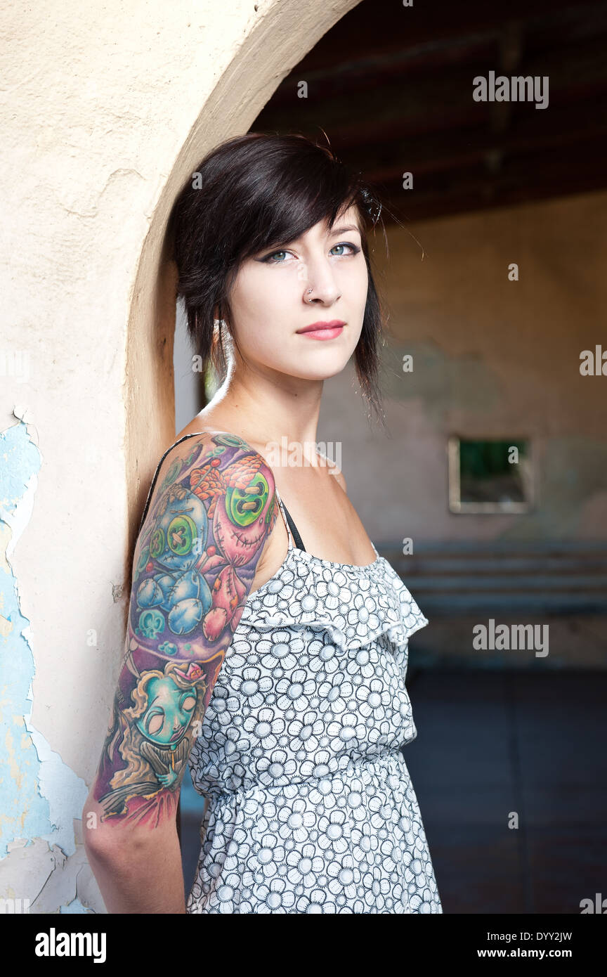 Gorgeous young female model with tattoo. Stock Photo