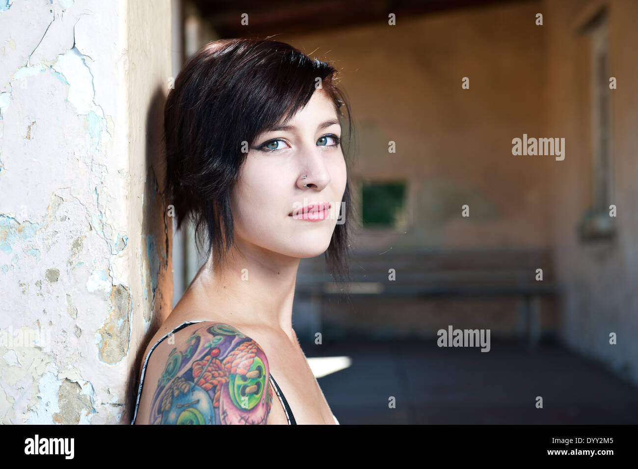 Gorgeous young female model with tattoo. Stock Photo